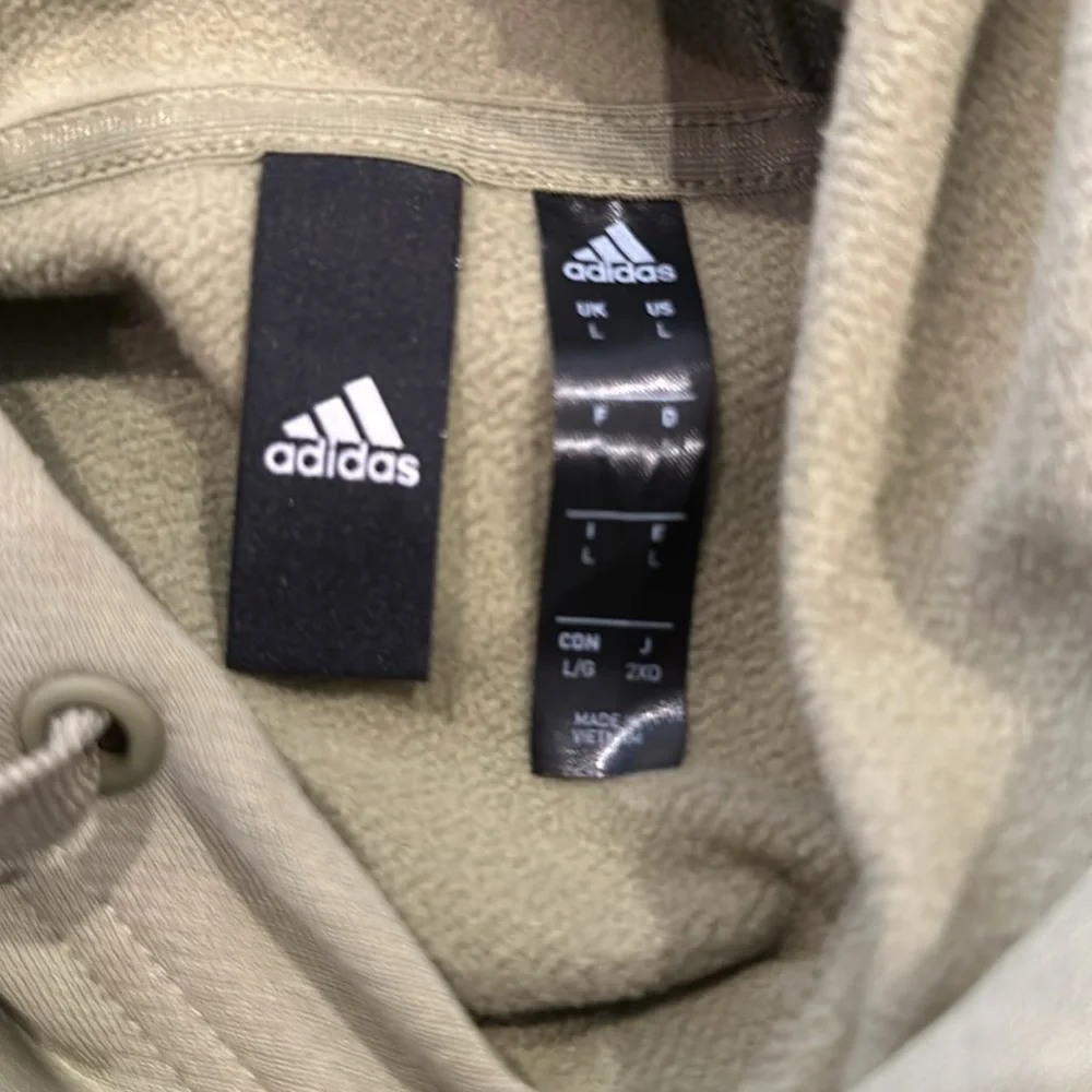 ADIDAS NWOT HOODIE MENS SIZE L ARMY GREEN FROM SAKS. NWOT